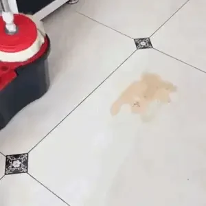 360 spin cleaning mop with bucket and microfiber head for floor cleaning in UAE homes